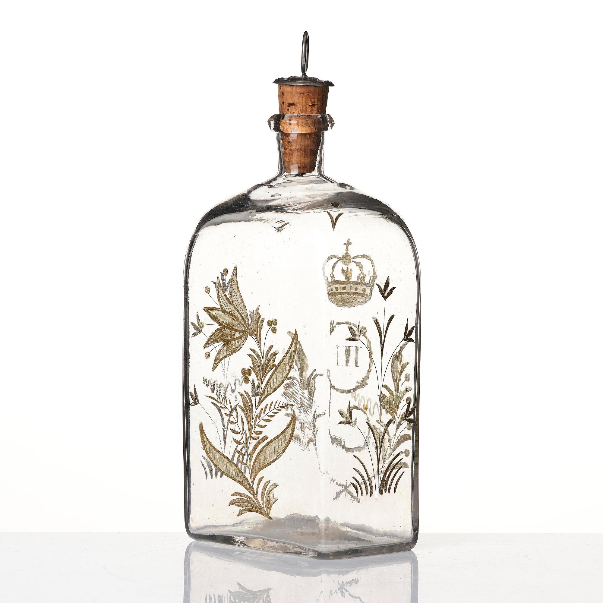 A set of six glasses and a bottle, Sweden, 18th century with King Gustavus IIIs monogram.