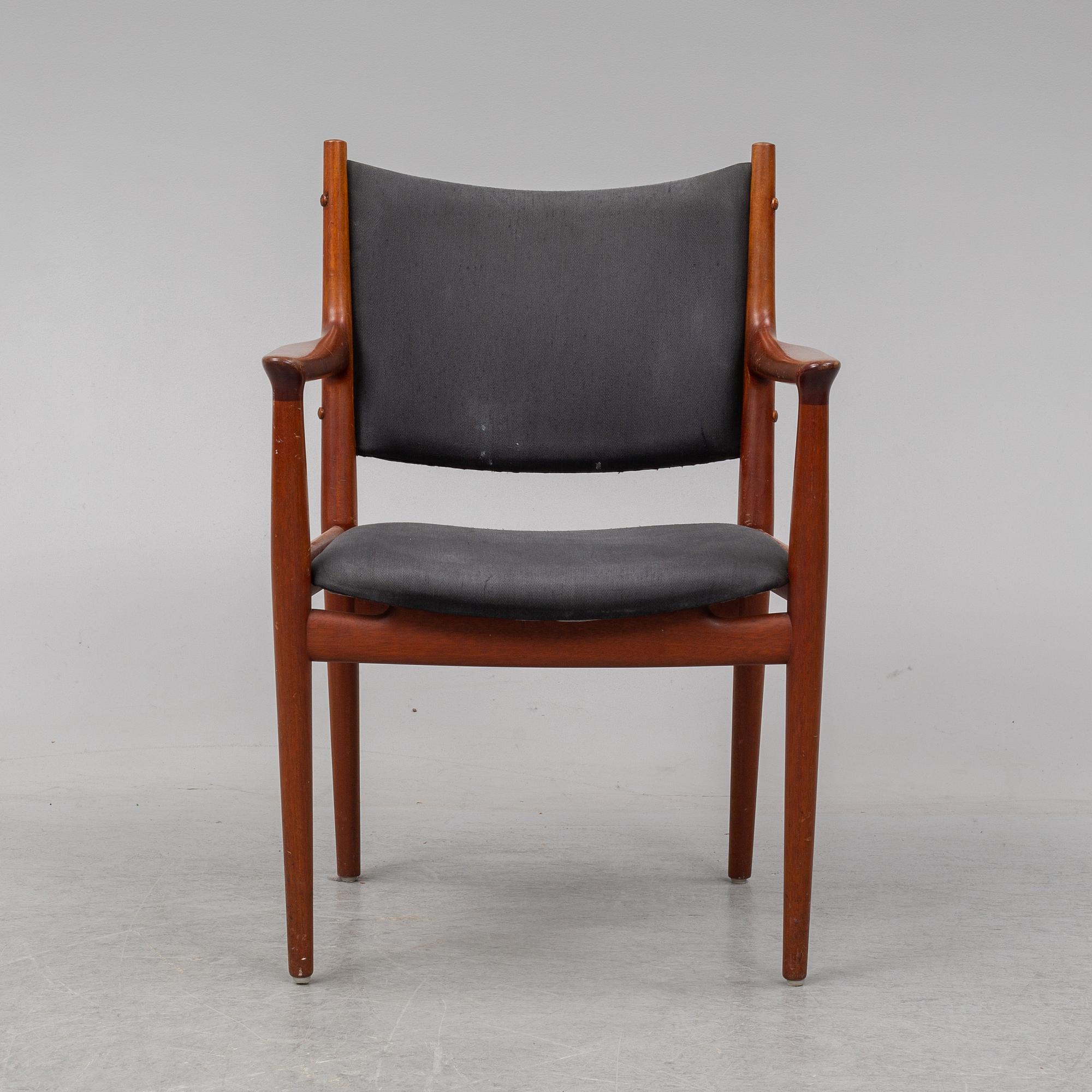 A teak armchair by Hans J Wegener for Johannes Hansen.
