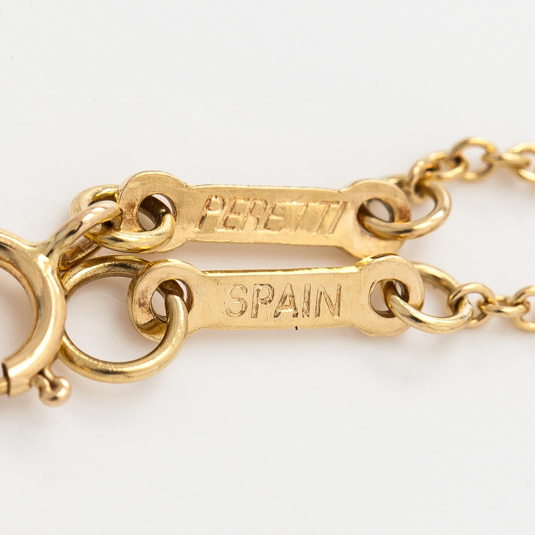 Tiffany & Co, Elsa Peretti, an 18K gold "Open Heart" necklace.