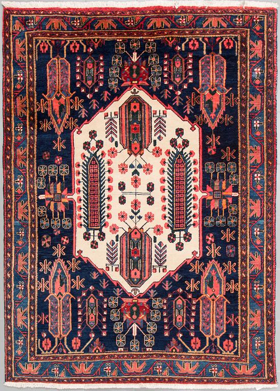 A north west persian rug, 218 x 159 cm.
