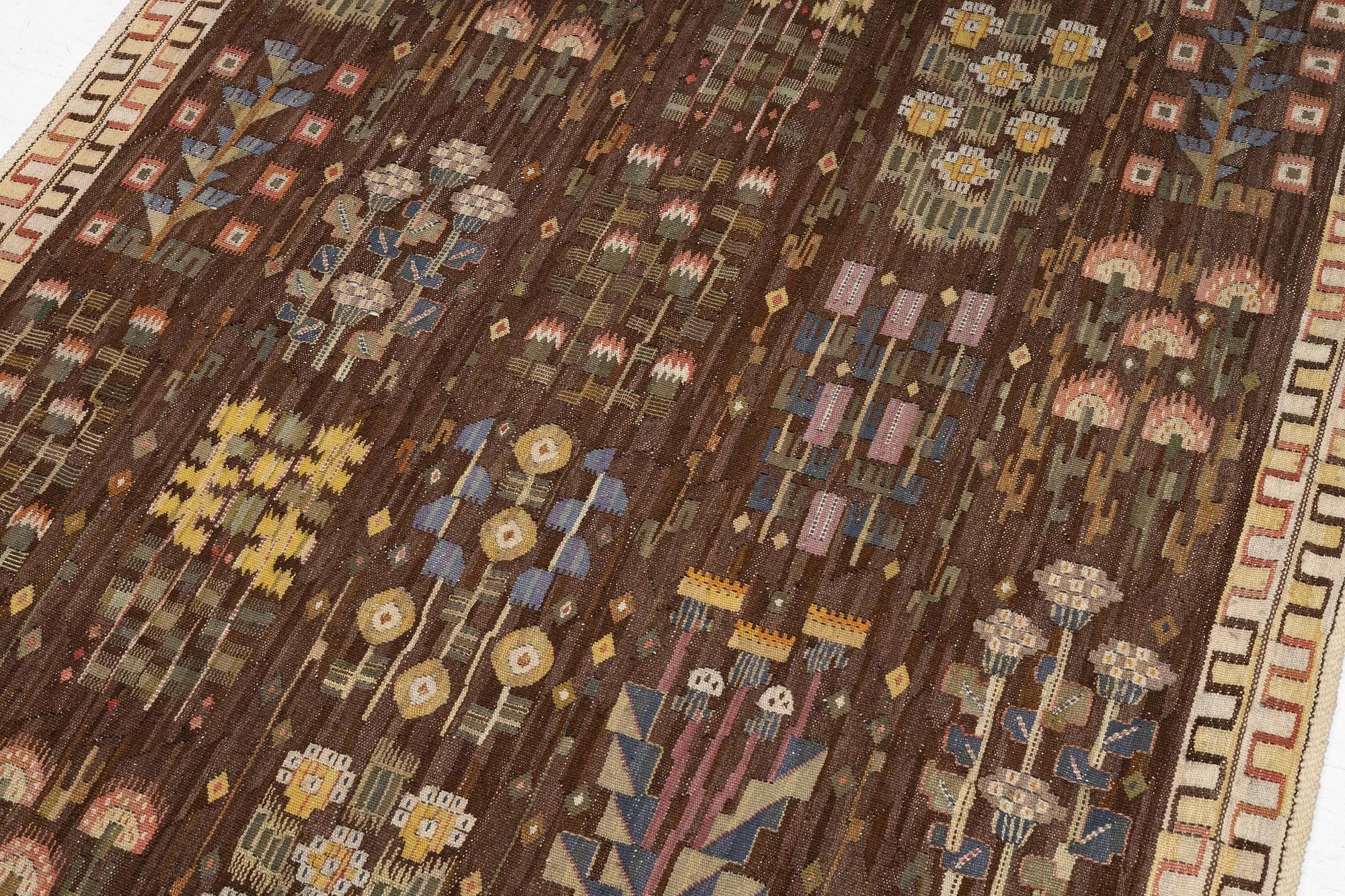 Märta Måås-Fjetterström, a tapestry, 'Juniblommor', tapestry weave, c. 271 x 163 cm, signed MMF.