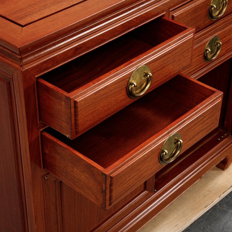 A pair of cupboards or sideboards, Yuen Cheong Furniture Co, Hong Kong, second half of the 20th century.