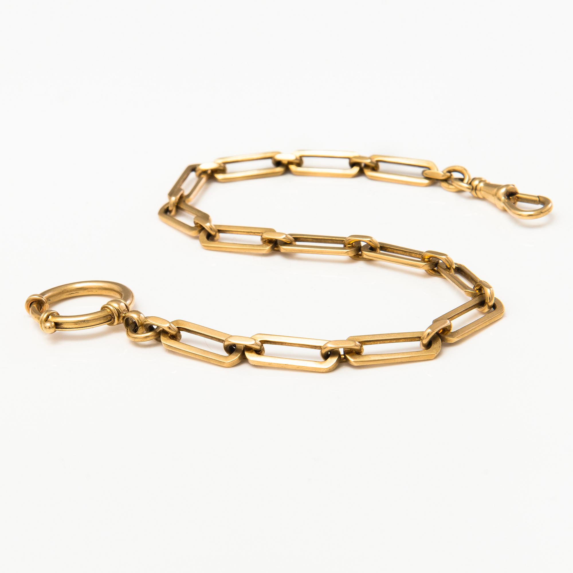 A 14K gold watch chain.