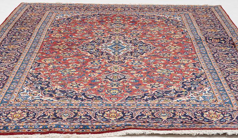 An oriental carpet, c. 340 x 240 cm.
