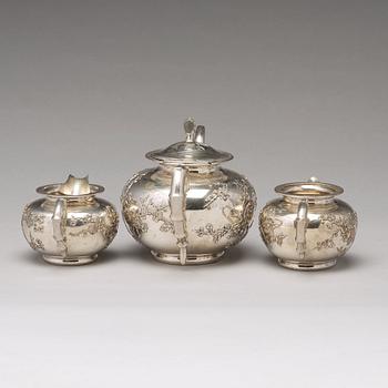 A Chinese export silver three-piece tea service, mark of Luen Wo, Shanghai, circa 1880-1925.