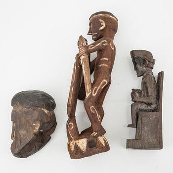 A set of three wooden Asmat sculptures, Indonesia, Jakarta, 20th Century.