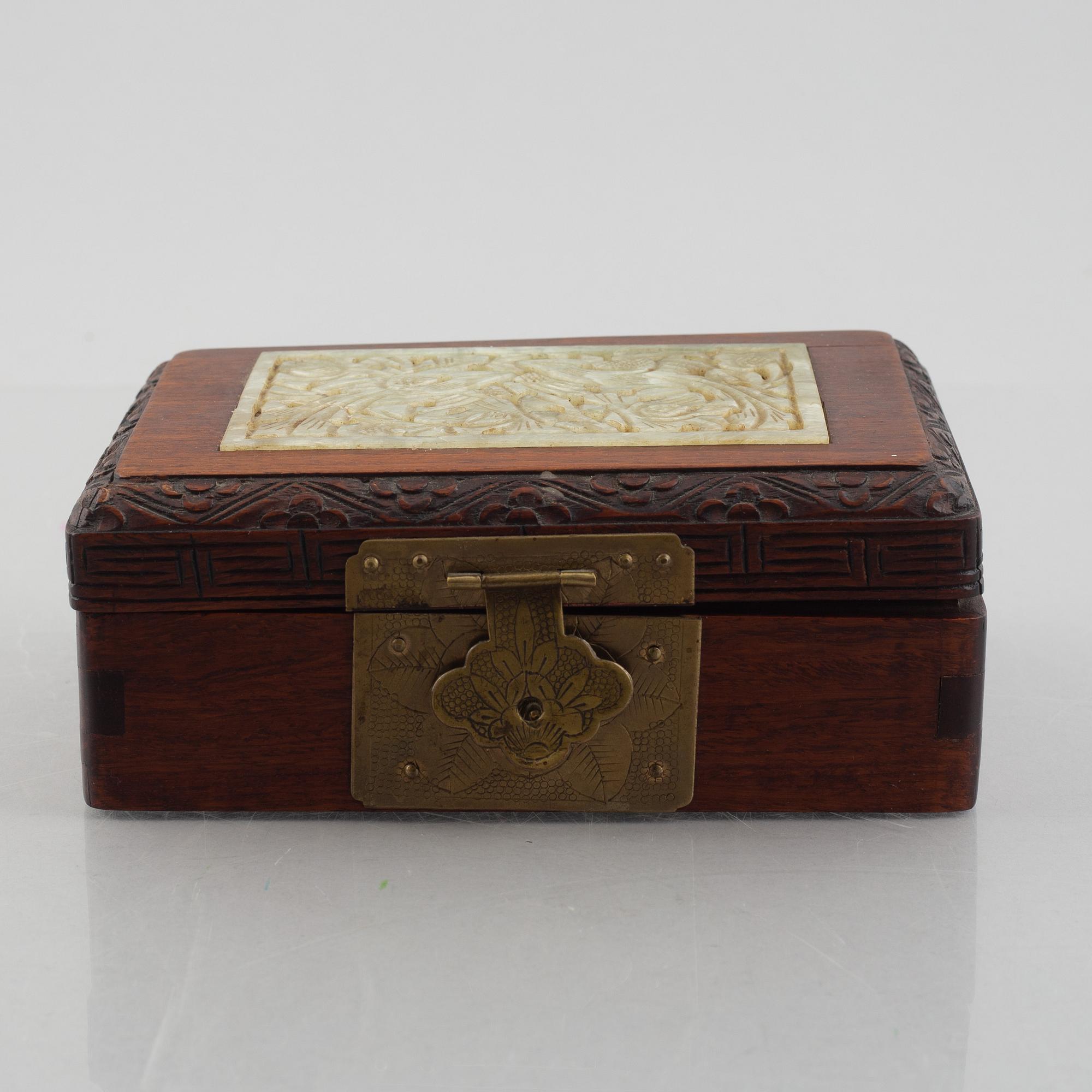 Two Chinese hardwood boxes with nephrite plaques, 20th century.