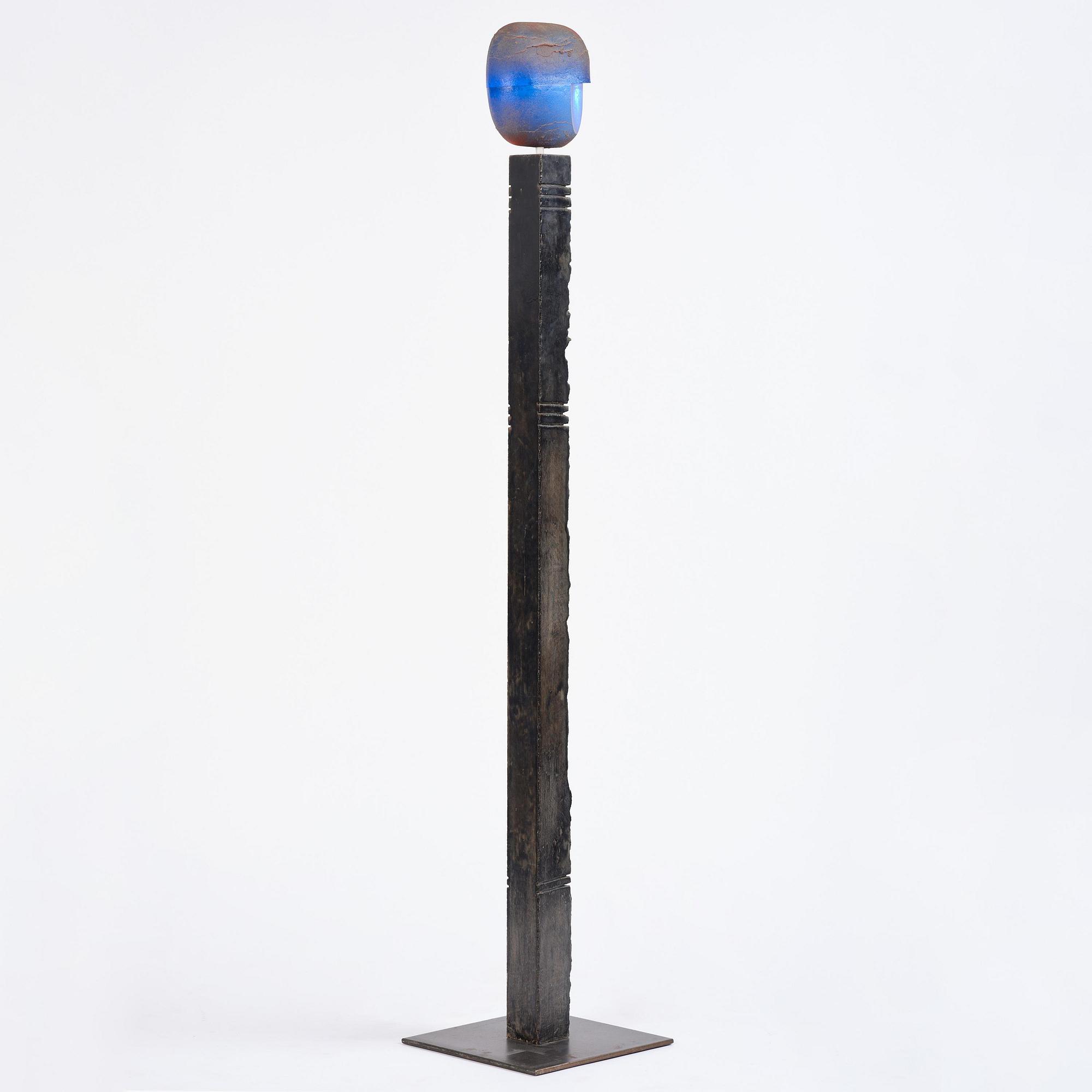 Bertil Vallien, a unique sand-cast glass sculpture of a head, on a high pedestal of polished limestone, Kosta Boda.