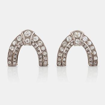 651. A pair of old cut diamond double clip brooches. Total carat weight of diamonds circa 5.50 cts.