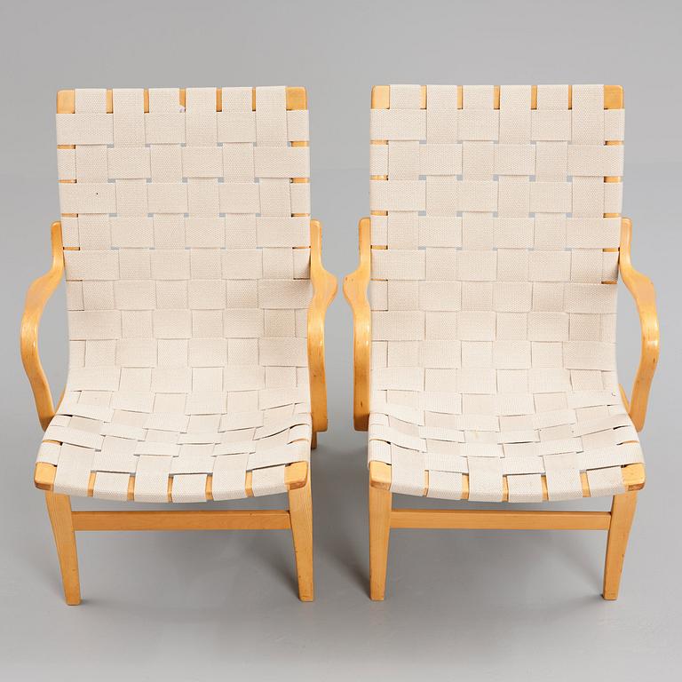 Bruno Mathsson, a pair of bent beech wood and textile girths 'Eva' lounge chairs, Firma Karl Mathsson, Sweden 1967.