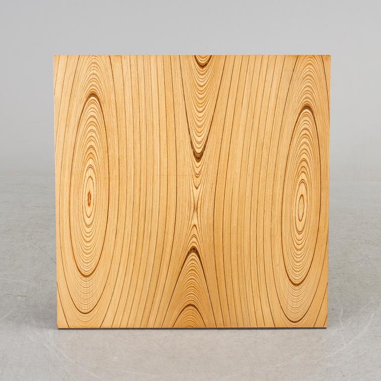 A coffee table marked Tapio Wirkkala, Asko, Made in Finland.