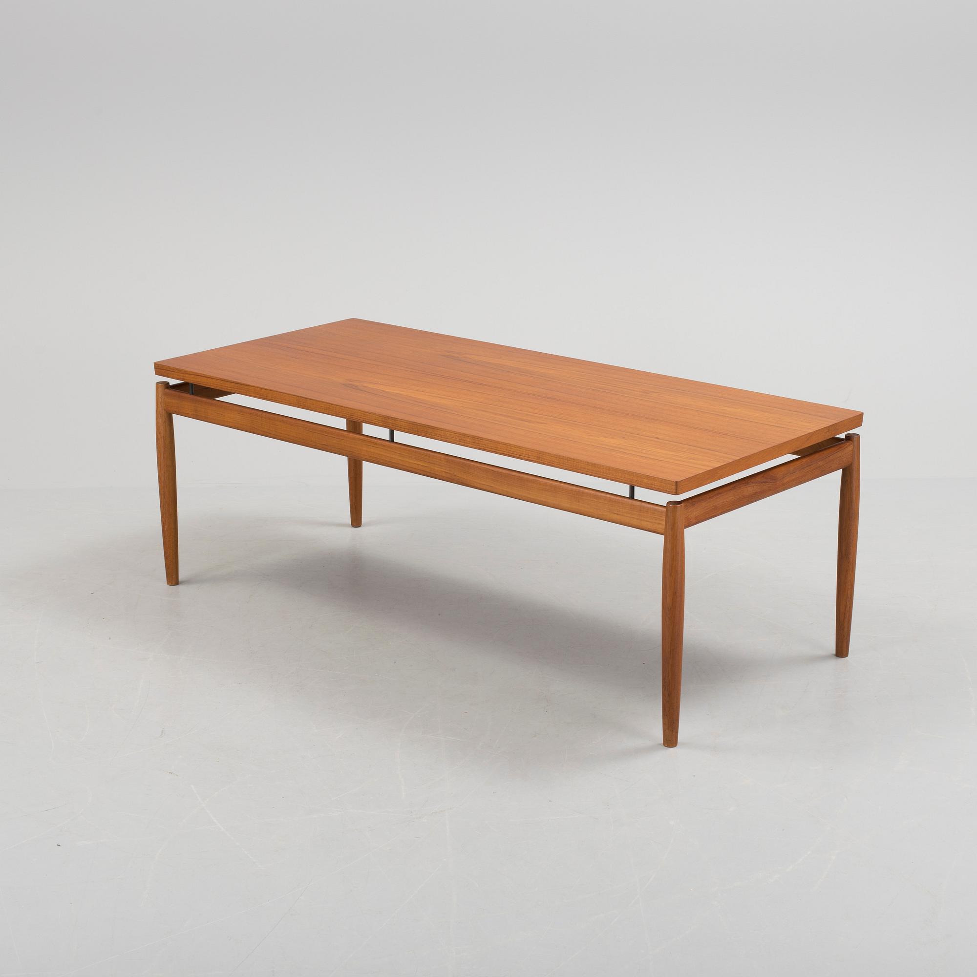 GRETE JALK, a teak coffee table fron France, Denmark, 1963.