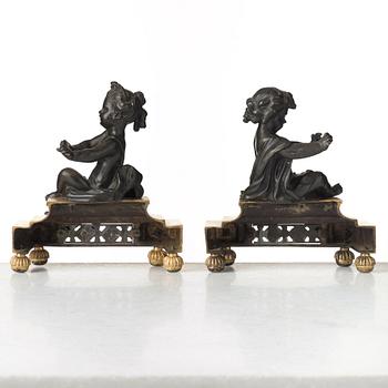 A pair of Louis XVI late 18th century fire dogs.