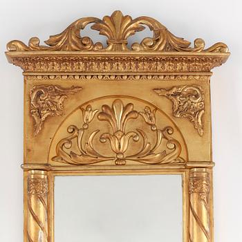 A first half of the 19th century Empire mirror.