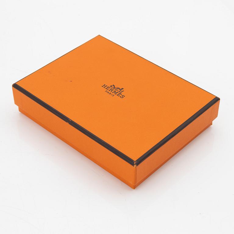 Hermès, notebook with leather case.