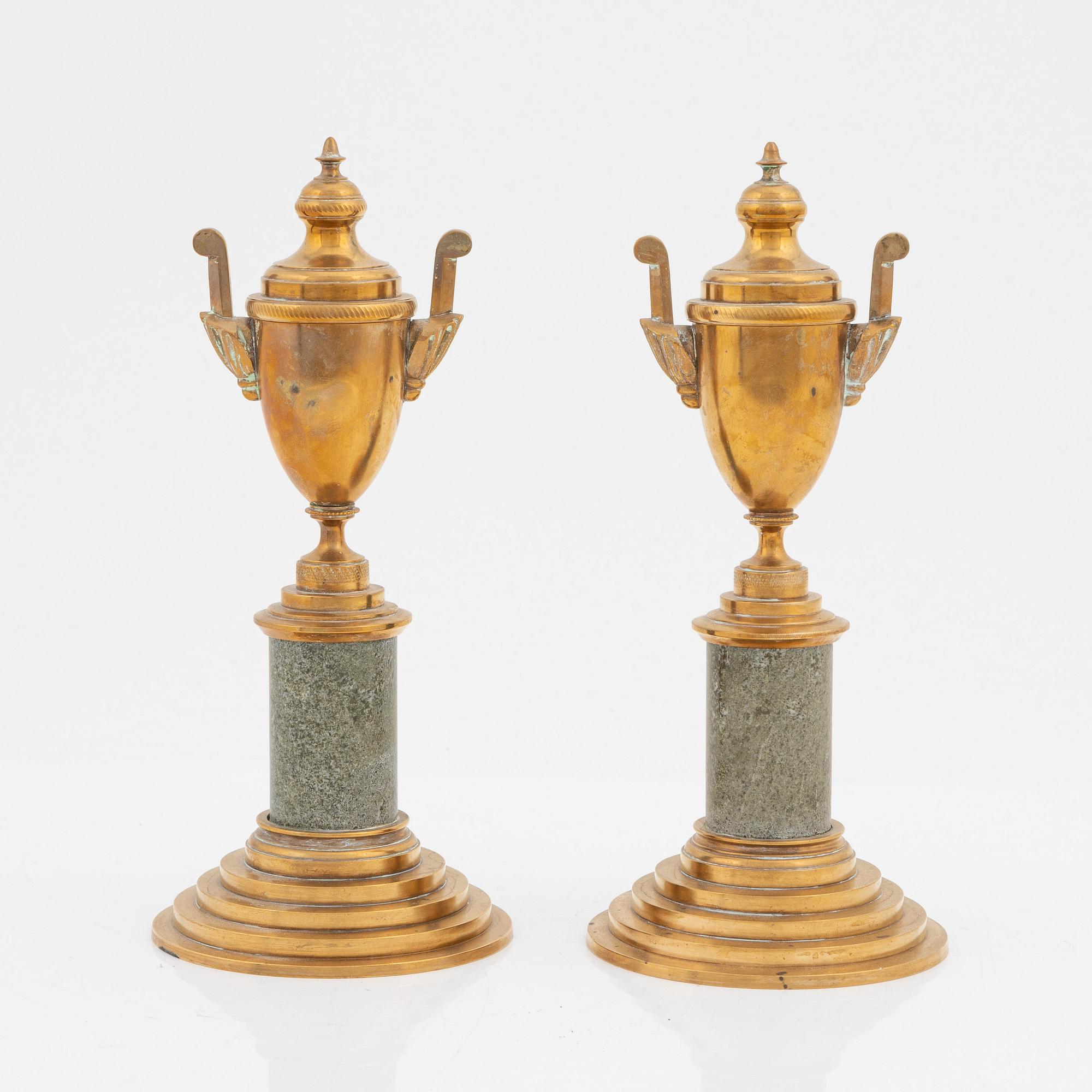 A pair of brass cassolettes from Skultuna Bruk.