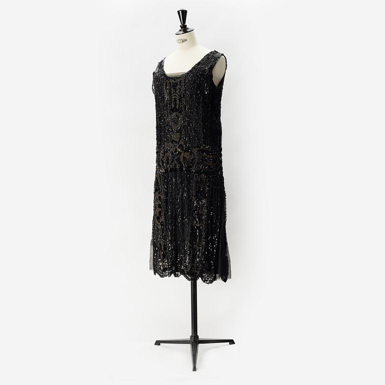 A sequin embroidered 1920's dress.