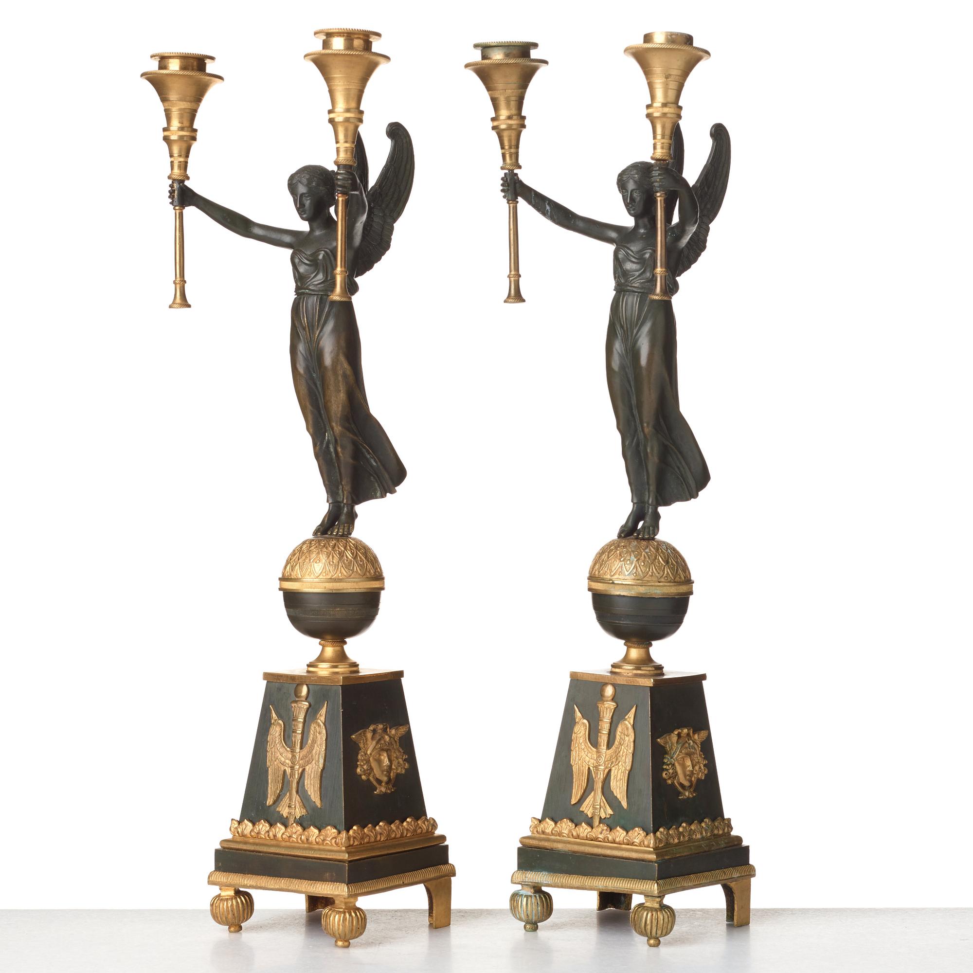 A pair of Empire-style 20th century candelabra.