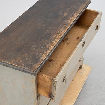A 19th century chest of drawers.