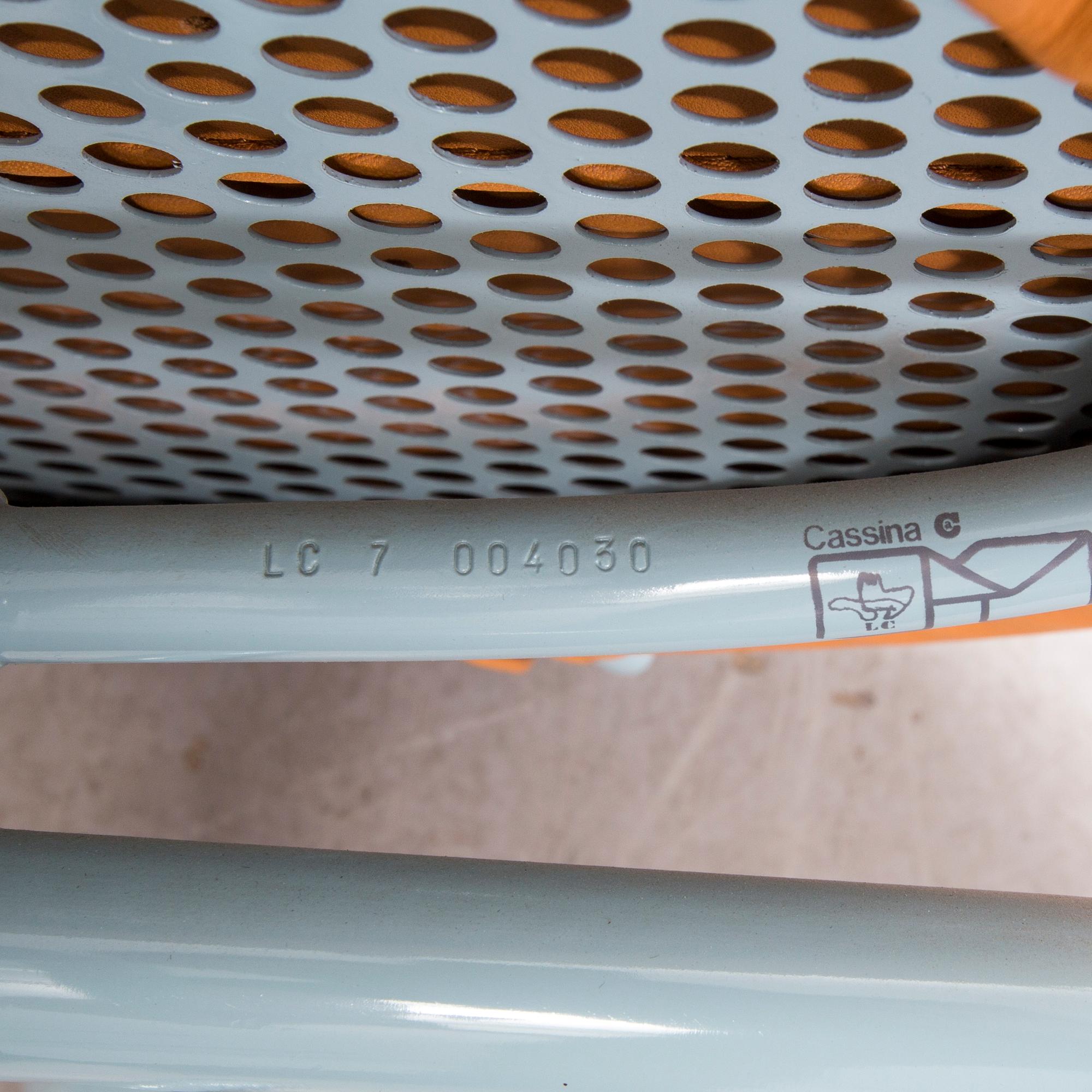 A set of four "LC7" chairs by Le Corbusier, Pierre Jeanneret and Charlotte Perriand for Cassina.