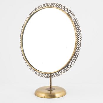 a Swedish Modern brass table mirror, 1940-tal.