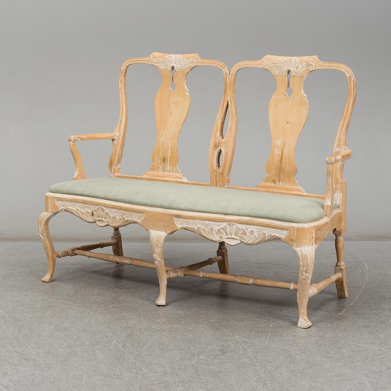 A mid 20th century Rococo style sofa.