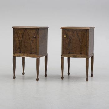 a pair of Art Déco bedside tables.