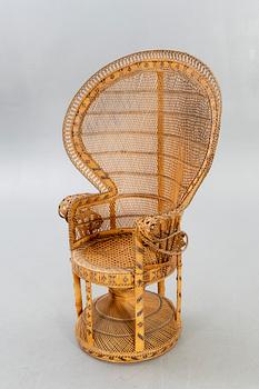 A mid 1900s wicker chair.