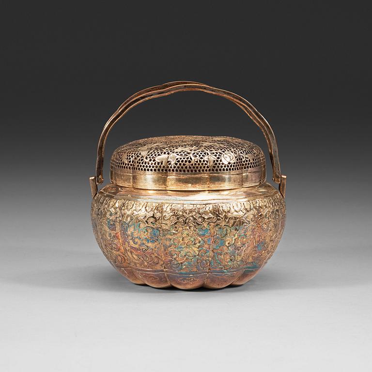 A silverplated copper hand warmer, Qing dynasty (1644-1912).