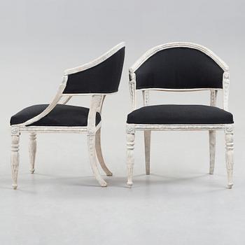 A pair of late Gustavian early 19th century armchairs.