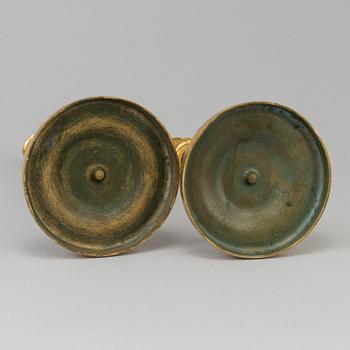 A pair of French Directoire late 18th century ormolu candelabra for three candles.