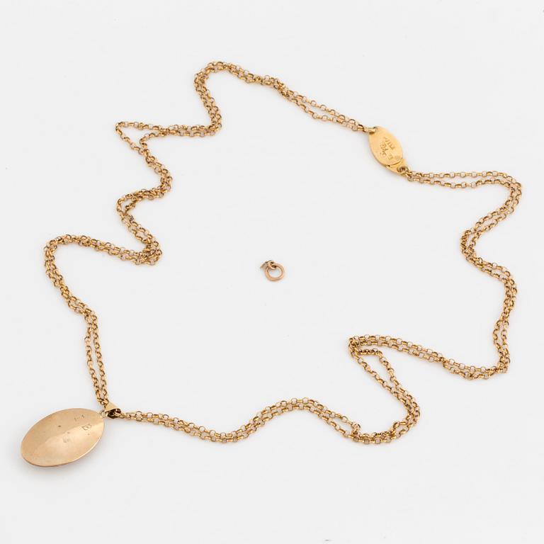 A chain and locket with hairwork.