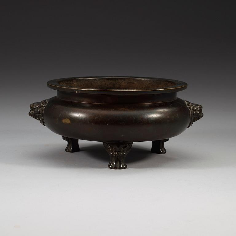 A large bronze tripod censer, Ming dynasty (1368-1644), with Xuande six character mark.