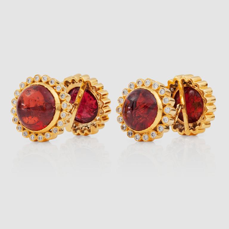 CUFFLINKS with cabochon-cut red spinels, total weight 28.17 cts, and brilliant-cut diamonds.