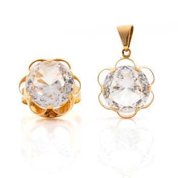 Ring and pendant, 18K gold with synthetic white stones.