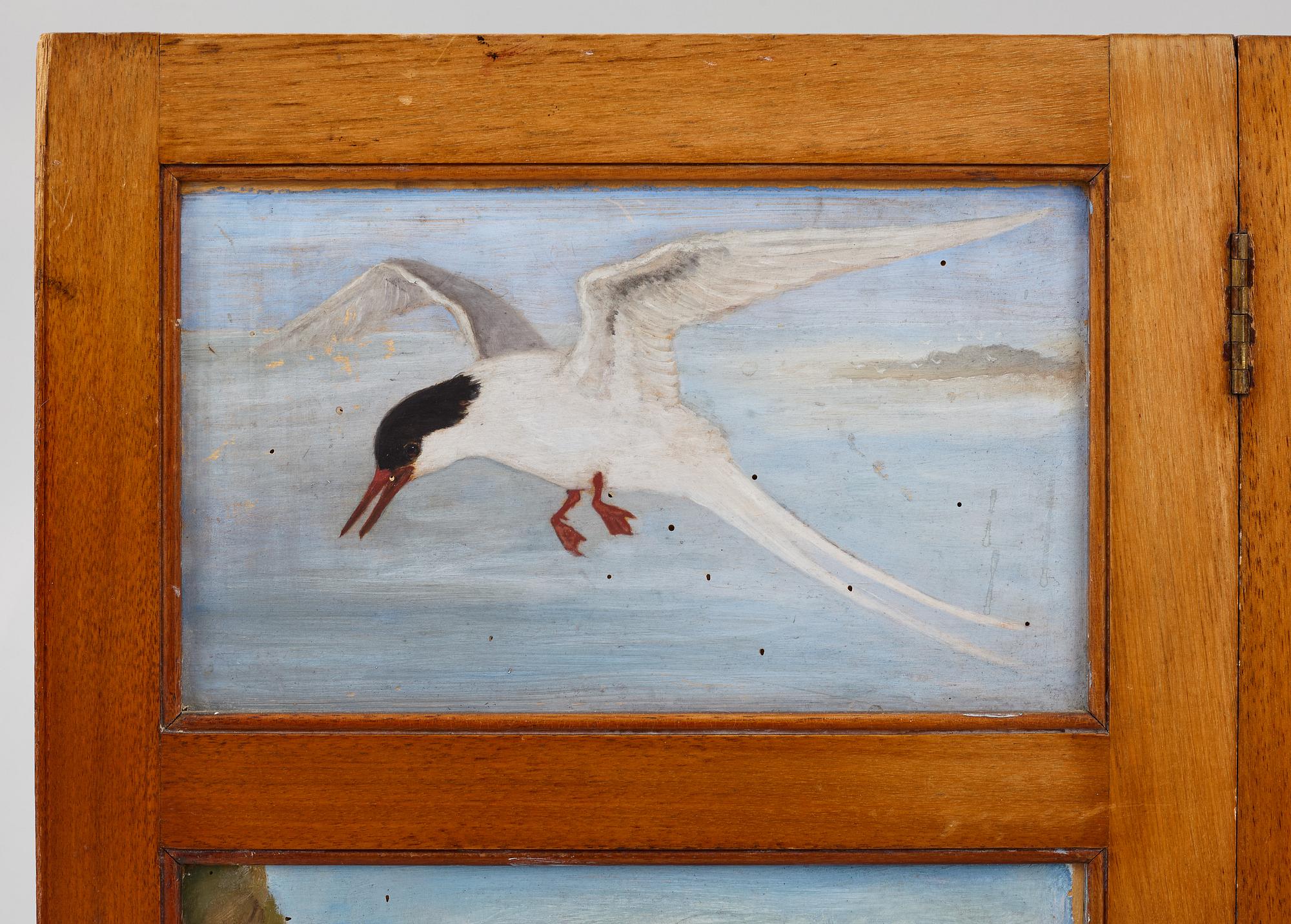 A folding screen, late 19th century.