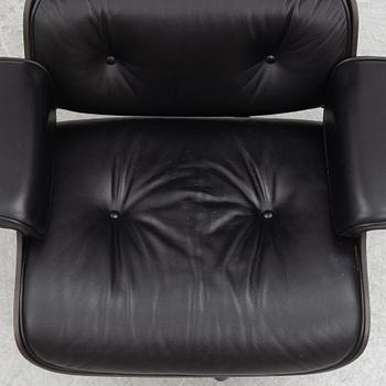 Charles & Ray Eames, an "Eames Lounge Chair" with ottoman, Vitra, 21st century.