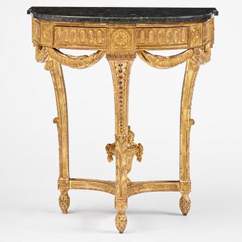 A Gustavian carved giltwood console table, Stockholm, late 18th century.