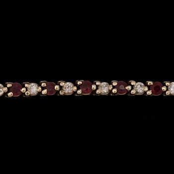 A ruby bracelet set with brilliant cut diamonds, tot. app. 1 ct.
