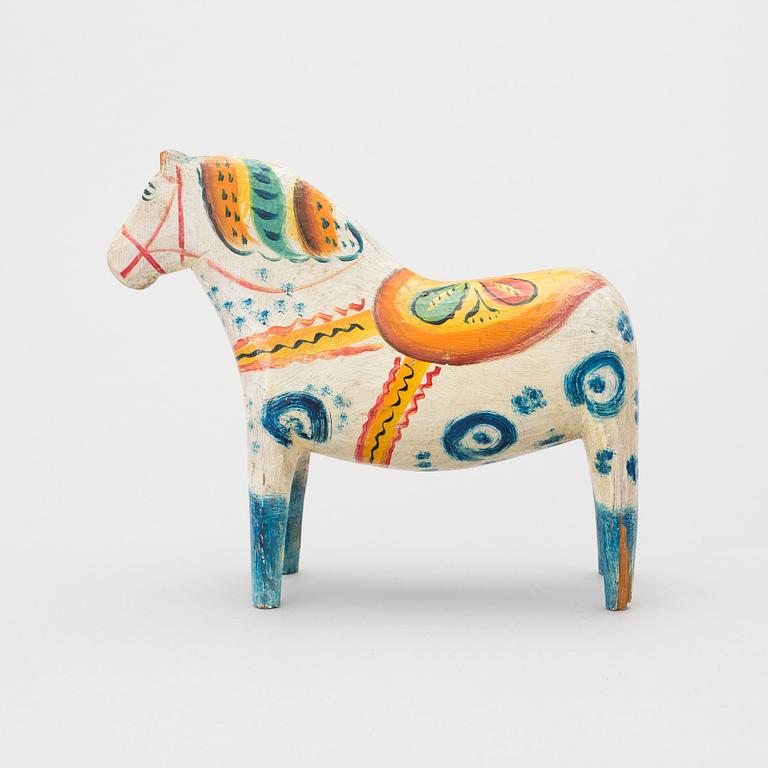 A painted folk art dala horse first half of the 20th century.