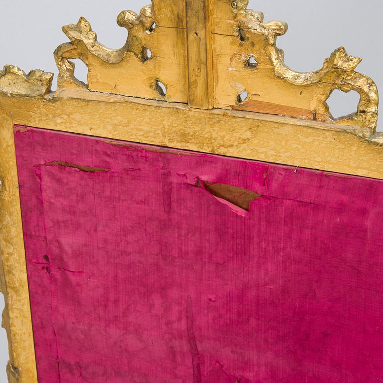 A Baroque style/Rococo revival brass protection, late 19th century.