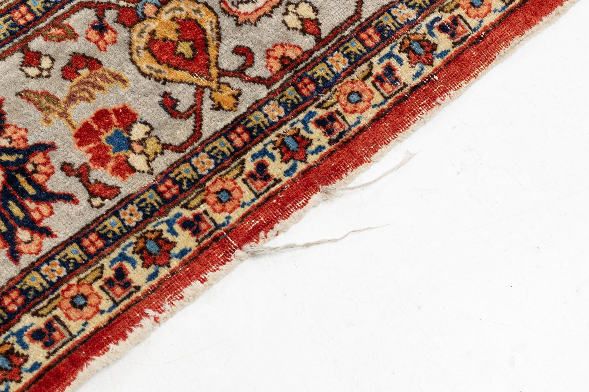 A oriental carpet, ca 320 x 223 cm.