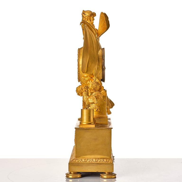 A French Empire mantel clock. Marked "LE NEPVEU A PARIS".