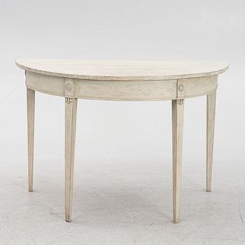 A crescent shaped Gustavian style table around 1900.
