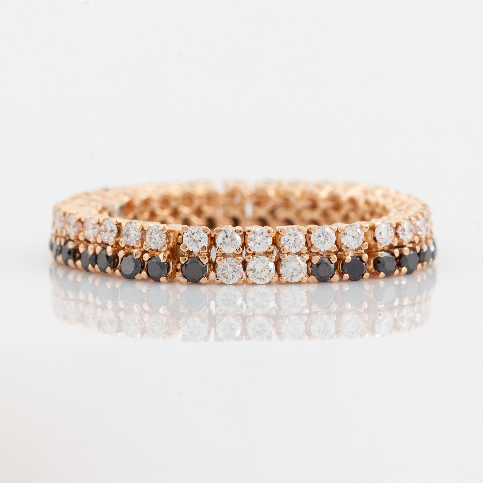 Black and colourless diamond ring.