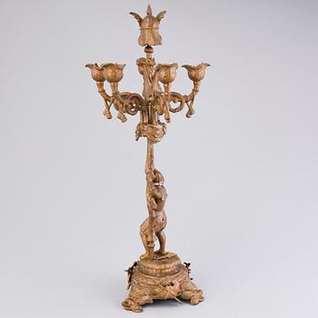 A candelabrum in copper metal alloy, end of the 19th Century.