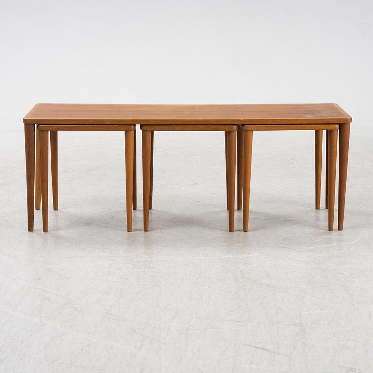 A four piece nesting table, mid 20th century.