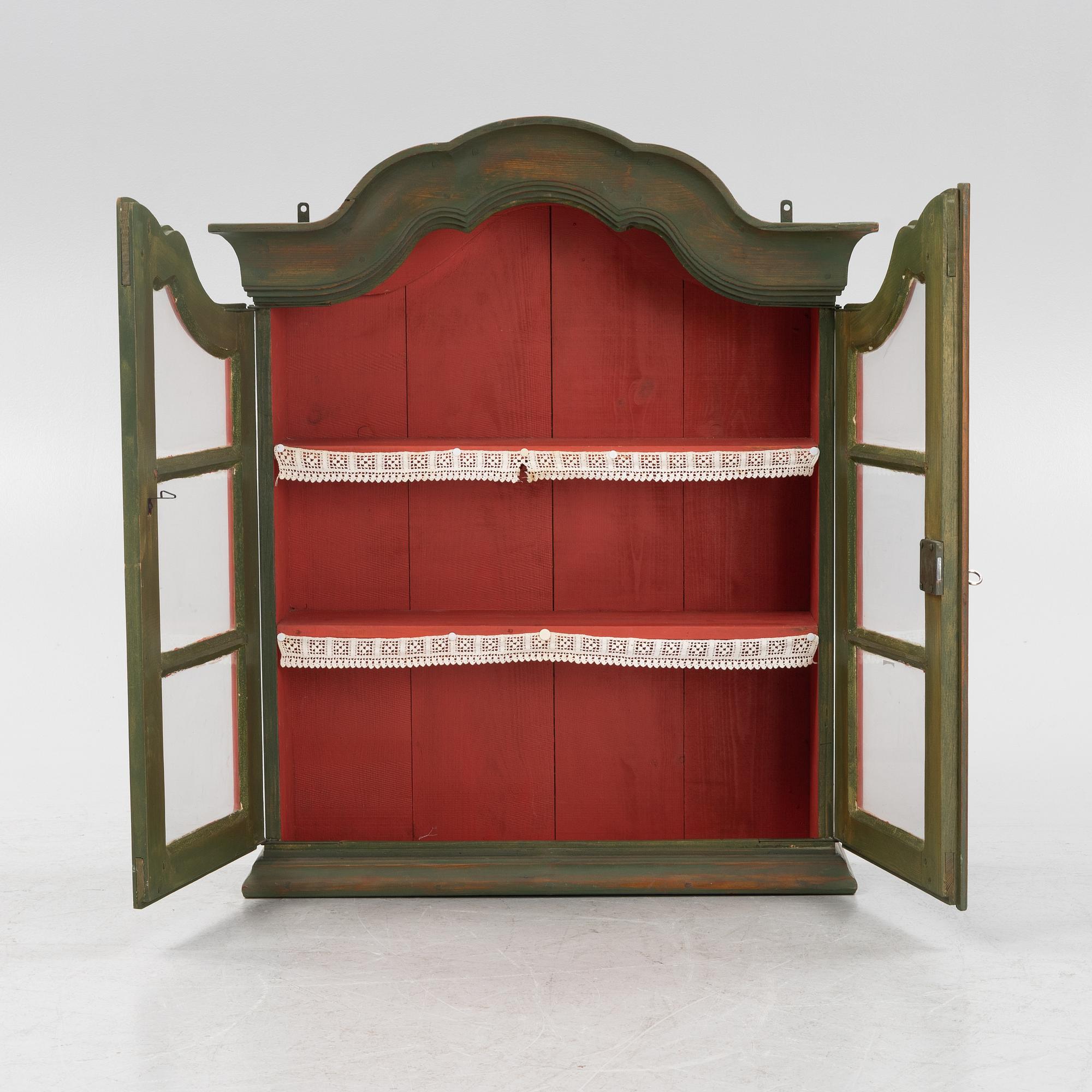 A painted wall cabinet. 19th/20th Century.