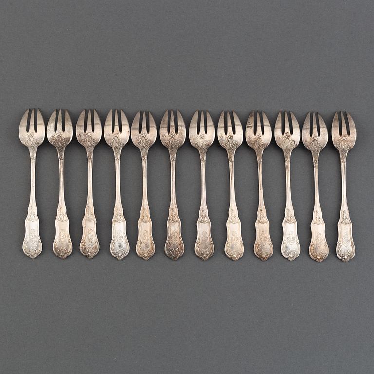 A set of twelve French silver oister-forks, after 1838.