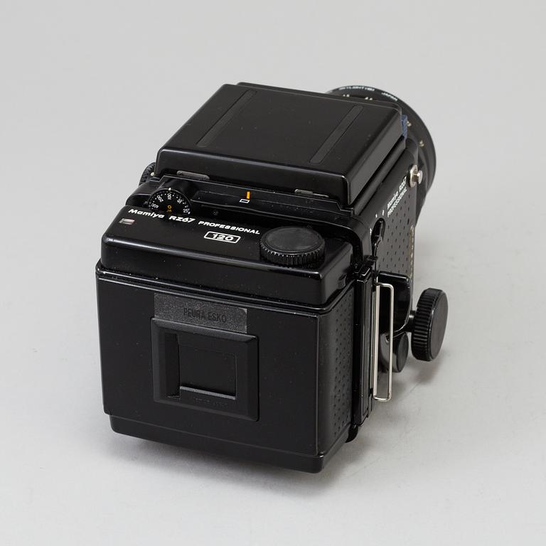 A black Mamiya RZ67 Pro Medium Format Camera Body with sekor z f = 110 mm 1:2.8 and sekor c f = 50 mm 1:4.5 lens.